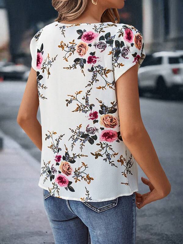 Blusa con mangas plisadas