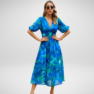 ABBY™ | VESTIDO ELEGANTE CON ESCOTE EN V Y MOTIVOS VIBRANTES